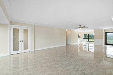 Exceptional residence with sweeping golf course views. Step into on Quail Ridge Golf Course and Country Club in Florida - for sale on GolfHomes.com, golf home, golf lot