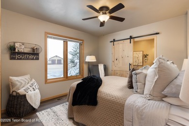 Spacious residence bordering the #7 hole at Cedar Creek Golf on  in Wyoming - for sale on GolfHomes.com, golf home, golf lot