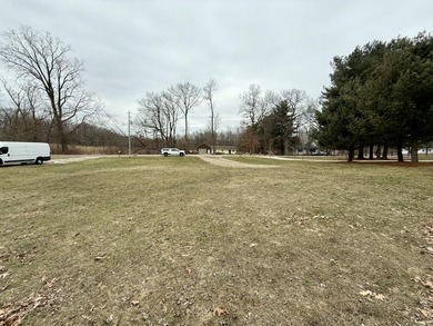 Discover Your Perfect Retreat on Duck Lake! Unlock the potential on Duck Lake Country Club in Michigan - for sale on GolfHomes.com, golf home, golf lot