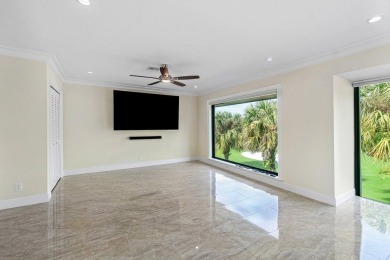 Exceptional residence with sweeping golf course views. Step into on Quail Ridge Golf Course and Country Club in Florida - for sale on GolfHomes.com, golf home, golf lot