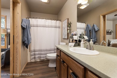 Spacious residence bordering the #7 hole at Cedar Creek Golf on  in Wyoming - for sale on GolfHomes.com, golf home, golf lot