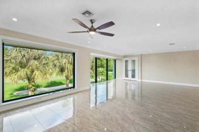 Exceptional residence with sweeping golf course views. Step into on Quail Ridge Golf Course and Country Club in Florida - for sale on GolfHomes.com, golf home, golf lot
