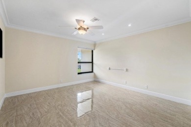 Exceptional residence with sweeping golf course views. Step into on Quail Ridge Golf Course and Country Club in Florida - for sale on GolfHomes.com, golf home, golf lot