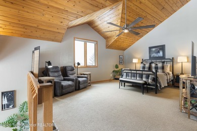 Spacious residence bordering the #7 hole at Cedar Creek Golf on  in Wyoming - for sale on GolfHomes.com, golf home, golf lot