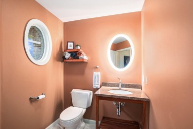 Experience the best of both worlds in this beautifully appointed on HawksHead Links in Michigan - for sale on GolfHomes.com, golf home, golf lot