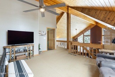 Spacious residence bordering the #7 hole at Cedar Creek Golf on  in Wyoming - for sale on GolfHomes.com, golf home, golf lot