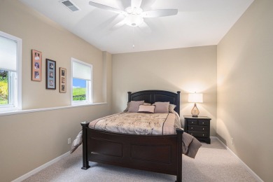 Experience the best of both worlds in this beautifully appointed on HawksHead Links in Michigan - for sale on GolfHomes.com, golf home, golf lot