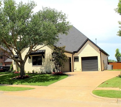 Looking for a modern custom built home recently built by an on Buffalo Creek Golf Club in Texas - for sale on GolfHomes.com, golf home, golf lot
