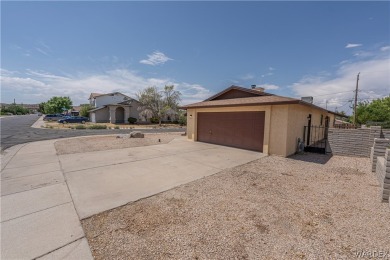 Welcome to this cozy yet sophisticated haven, recently given a on Cerbat Cliffs Golf Course in Arizona - for sale on GolfHomes.com, golf home, golf lot