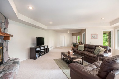 Experience the best of both worlds in this beautifully appointed on HawksHead Links in Michigan - for sale on GolfHomes.com, golf home, golf lot