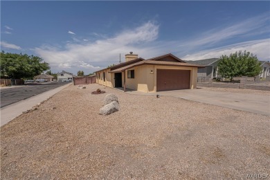 Welcome to this cozy yet sophisticated haven, recently given a on Cerbat Cliffs Golf Course in Arizona - for sale on GolfHomes.com, golf home, golf lot