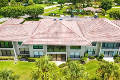 Exceptional residence with sweeping golf course views. Step into on Quail Ridge Golf Course and Country Club in Florida - for sale on GolfHomes.com, golf home, golf lot