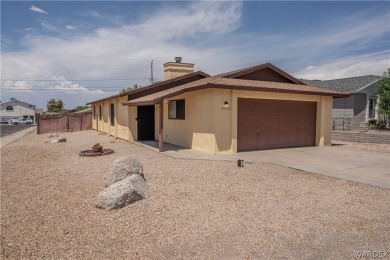 Welcome to this cozy yet sophisticated haven, recently given a on Cerbat Cliffs Golf Course in Arizona - for sale on GolfHomes.com, golf home, golf lot