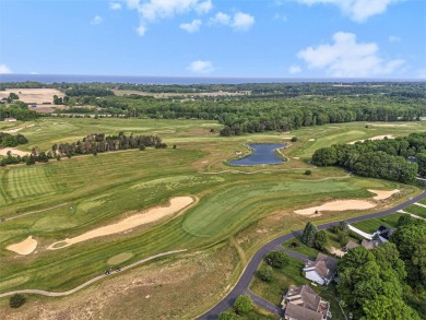 Experience the best of both worlds in this beautifully appointed on HawksHead Links in Michigan - for sale on GolfHomes.com, golf home, golf lot