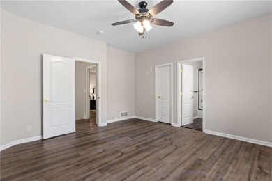 Discover refined elegance in this fully remodeled 5-bedroom,4.5 on Ironhorse Golf Club in Kansas - for sale on GolfHomes.com, golf home, golf lot