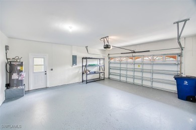 COMPLETELY RENOVATED POOL HOME IN A PRIVATE GATED GOLF COMMUNITY on Kelly Greens Golf and Country Club in Florida - for sale on GolfHomes.com, golf home, golf lot