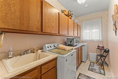 Welcome to this gorgeous 4-bedroom colonial in the heart of on Riverview Highlands Golf Club  in Michigan - for sale on GolfHomes.com, golf home, golf lot