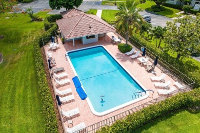 Exceptional residence with sweeping golf course views. Step into on Quail Ridge Golf Course and Country Club in Florida - for sale on GolfHomes.com, golf home, golf lot