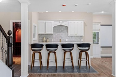 Discover refined elegance in this fully remodeled 5-bedroom,4.5 on Ironhorse Golf Club in Kansas - for sale on GolfHomes.com, golf home, golf lot
