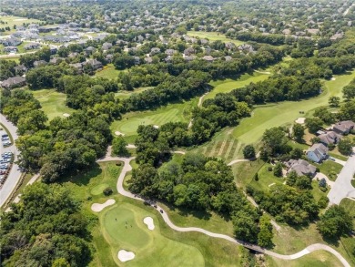 Discover refined elegance in this fully remodeled 5-bedroom,4.5 on Ironhorse Golf Club in Kansas - for sale on GolfHomes.com, golf home, golf lot