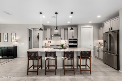 Experience luxury living and unforgettable Arizona evenings in on Copper Canyon Golf Club in Arizona - for sale on GolfHomes.com, golf home, golf lot