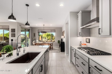 Experience luxury living and unforgettable Arizona evenings in on Copper Canyon Golf Club in Arizona - for sale on GolfHomes.com, golf home, golf lot