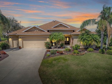 LOVELY CUSTOM EXPANDED WILLIAMSBURG PREMIER home with over 3000 on Palmer Legends Country Club in Florida - for sale on GolfHomes.com, golf home, golf lot