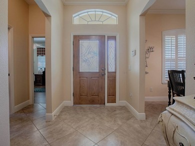 LOVELY CUSTOM EXPANDED WILLIAMSBURG PREMIER home with over 3000 on Palmer Legends Country Club in Florida - for sale on GolfHomes.com, golf home, golf lot