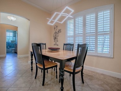 LOVELY CUSTOM EXPANDED WILLIAMSBURG PREMIER home with over 3000 on Palmer Legends Country Club in Florida - for sale on GolfHomes.com, golf home, golf lot