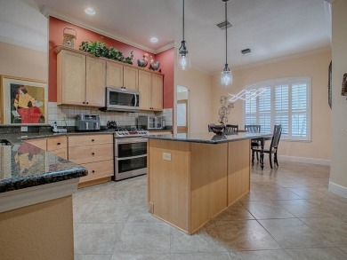 LOVELY CUSTOM EXPANDED WILLIAMSBURG PREMIER home with over 3000 on Palmer Legends Country Club in Florida - for sale on GolfHomes.com, golf home, golf lot