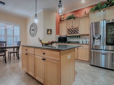 LOVELY CUSTOM EXPANDED WILLIAMSBURG PREMIER home with over 3000 on Palmer Legends Country Club in Florida - for sale on GolfHomes.com, golf home, golf lot