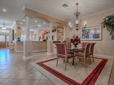 LOVELY CUSTOM EXPANDED WILLIAMSBURG PREMIER home with over 3000 on Palmer Legends Country Club in Florida - for sale on GolfHomes.com, golf home, golf lot