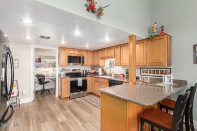 Discover this end-unit townhome in Camelot Country Club Estates! on Painted Mountain Golf Club in Arizona - for sale on GolfHomes.com, golf home, golf lot