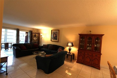 REDUCED! Spacious 2-bedroom, 2-bathroom condo on the 3rd floor on Wynmoor Golf Course in Florida - for sale on GolfHomes.com, golf home, golf lot