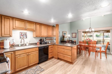 Discover this end-unit townhome in Camelot Country Club Estates! on Painted Mountain Golf Club in Arizona - for sale on GolfHomes.com, golf home, golf lot