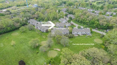Absolutely beautiful Woodland Green end unit ranch with sunny on Fox Lake Country Club, Inc. in Illinois - for sale on GolfHomes.com, golf home, golf lot