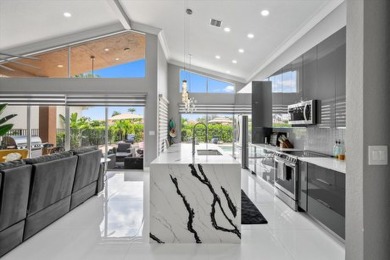 Welcome to this ultra-modern, fully remodeled home in the on Wycliffe Golf and Country Club in Florida - for sale on GolfHomes.com, golf home, golf lot