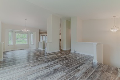 Absolutely beautiful Woodland Green end unit ranch with sunny on Fox Lake Country Club, Inc. in Illinois - for sale on GolfHomes.com, golf home, golf lot