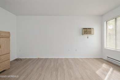 Covered Bridge at it's best! First floor corner unit. Light and on Pine Brook Golf Course in New Jersey - for sale on GolfHomes.com, golf home, golf lot