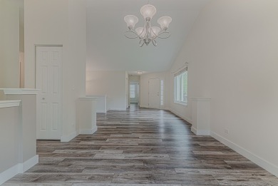 Absolutely beautiful Woodland Green end unit ranch with sunny on Fox Lake Country Club, Inc. in Illinois - for sale on GolfHomes.com, golf home, golf lot