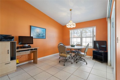 Welcome to 34 Woodfield Drive, a beautifully maintained on The Grand Club - Pine Lakes Course in Florida - for sale on GolfHomes.com, golf home, golf lot