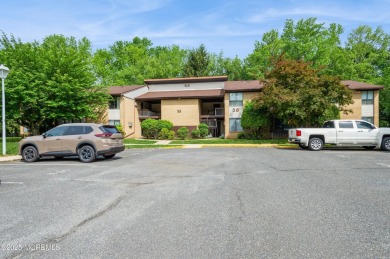 Covered Bridge at it's best! First floor corner unit. Light and on Pine Brook Golf Course in New Jersey - for sale on GolfHomes.com, golf home, golf lot
