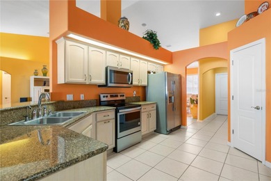 Welcome to 34 Woodfield Drive, a beautifully maintained on The Grand Club - Pine Lakes Course in Florida - for sale on GolfHomes.com, golf home, golf lot