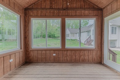 Absolutely beautiful Woodland Green end unit ranch with sunny on Fox Lake Country Club, Inc. in Illinois - for sale on GolfHomes.com, golf home, golf lot
