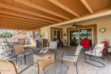 Discover this end-unit townhome in Camelot Country Club Estates! on Painted Mountain Golf Club in Arizona - for sale on GolfHomes.com, golf home, golf lot