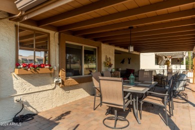 Discover this end-unit townhome in Camelot Country Club Estates! on Painted Mountain Golf Club in Arizona - for sale on GolfHomes.com, golf home, golf lot