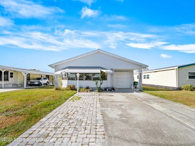 Welcome to your dream home in Barefoot Bay! This spacious on Barefoot Bay Golf Course in Florida - for sale on GolfHomes.com, golf home, golf lot