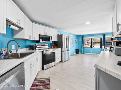 Welcome to your dream home in Barefoot Bay! This spacious on Barefoot Bay Golf Course in Florida - for sale on GolfHomes.com, golf home, golf lot