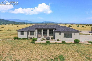 Gorgeous one level home on 5 acres with stunning mountain views! on Hollydot Golf Course in Colorado - for sale on GolfHomes.com, golf home, golf lot