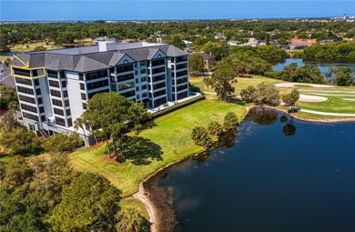 Welcome to this exquisitely updated 3-bedroom, 2-bath top-floor on Feather Sound Country Club in Florida - for sale on GolfHomes.com, golf home, golf lot